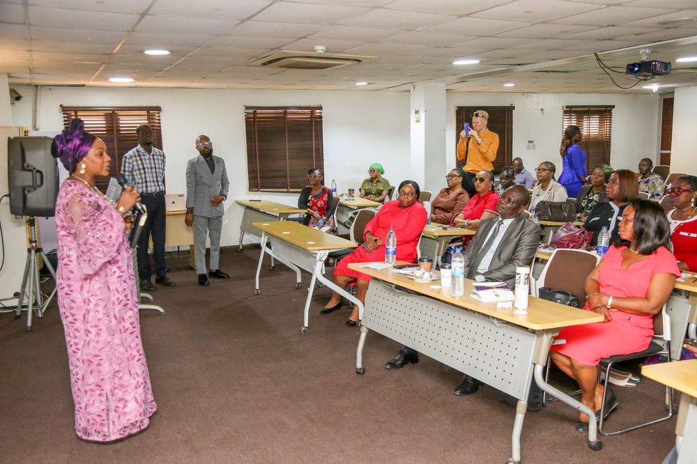 Facilitator addressing delegates during a Trafto-branded training session
